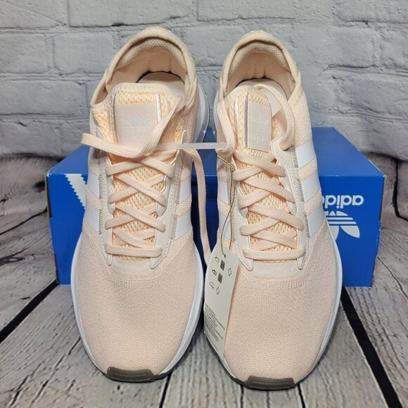 Womens adidas Swift Run Athletic Shoe- Pastel Pink - Picture 1 of 8